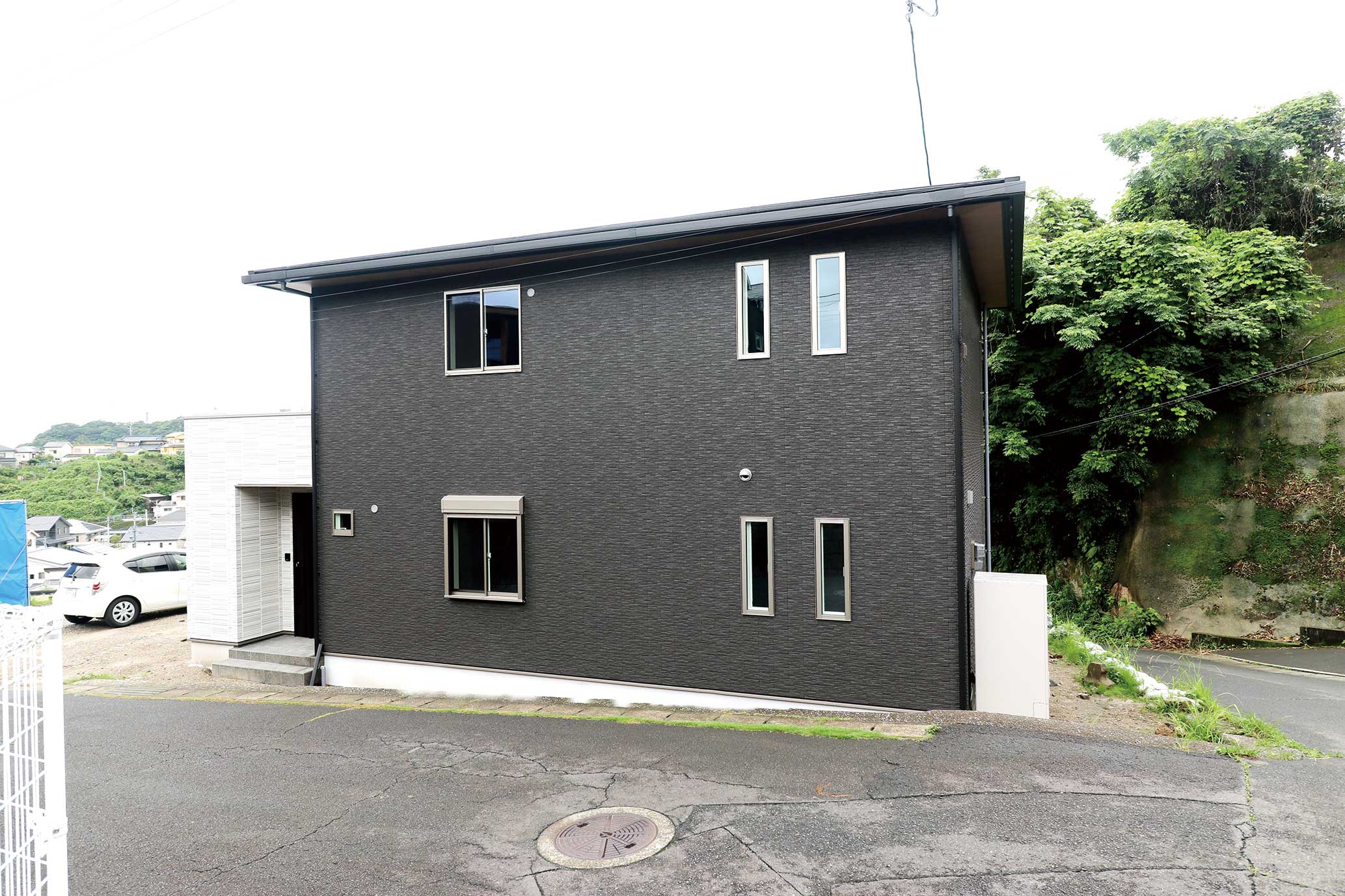 桜島を望む高台に建つ解放感たっぷりの高性能の二階建て